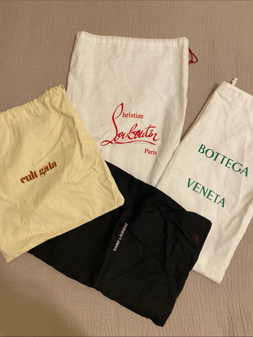 Saint Laurent , Cult Gaia , Bottega Veneta, Louboution . Mix dust bags . Set 4